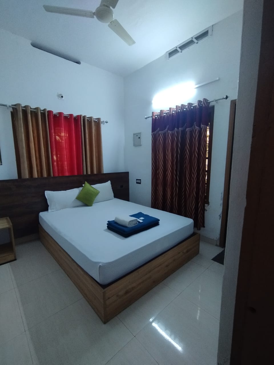 Room with red and gold curtains
